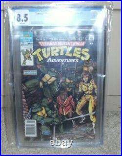 Teenage Mutant Ninja Turtles Adventures #1 CGC 8.5 1st Comic Book App Of Krang